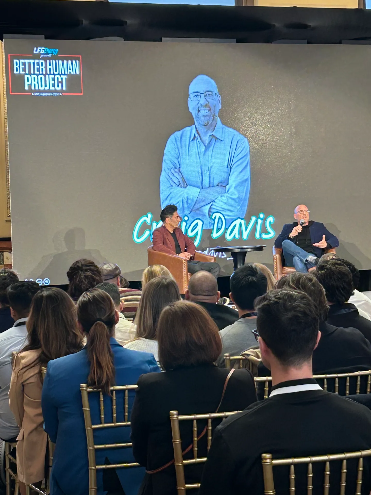 Craig Davis in a fireside chat on stage at the Better Human Project