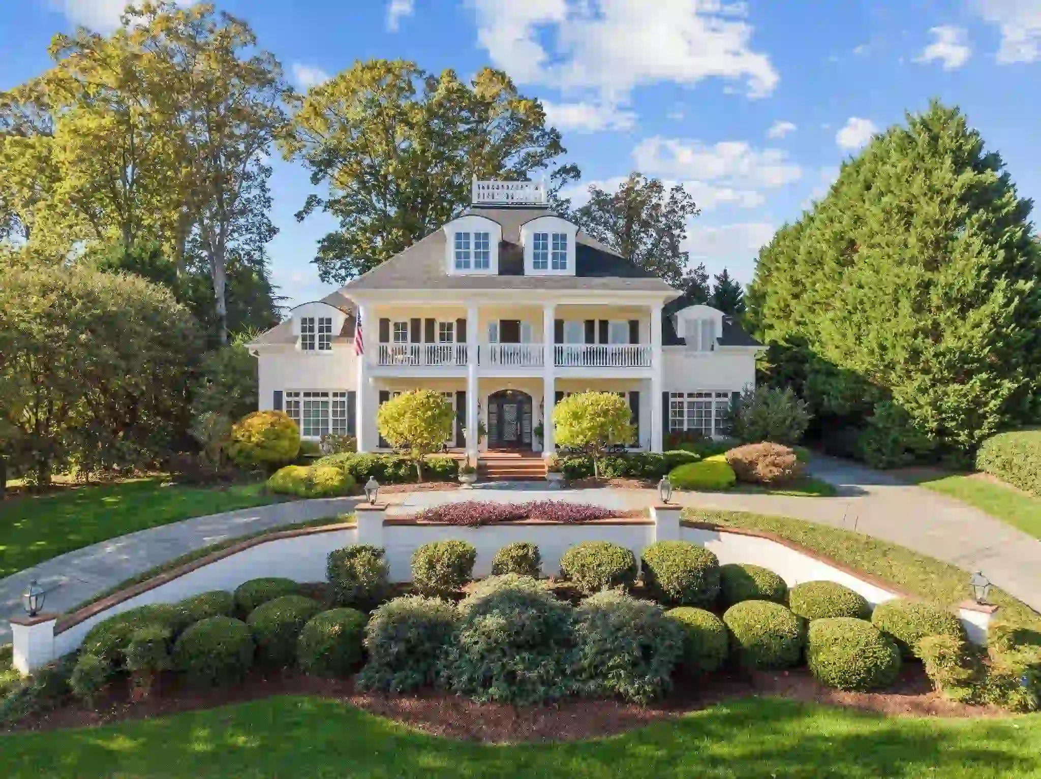 Wakefield neighborhood home in North Raleigh with brick exterior and mature landscaping
