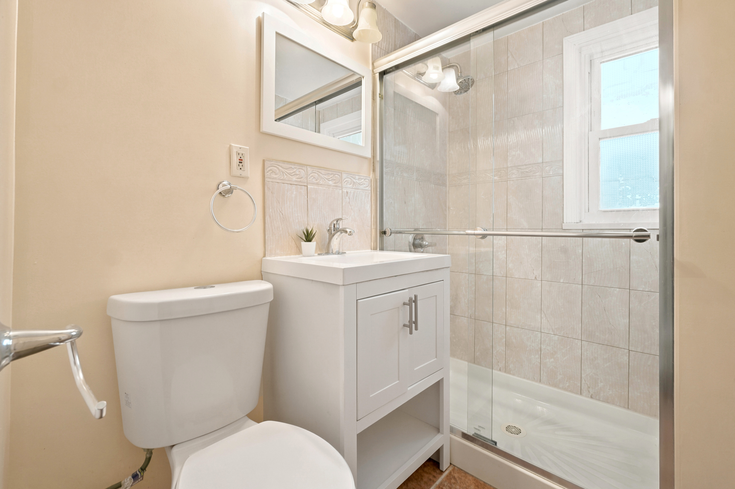 Renovated upstairs bathroom at 50 Heather Ln with a glass-enclosed shower
