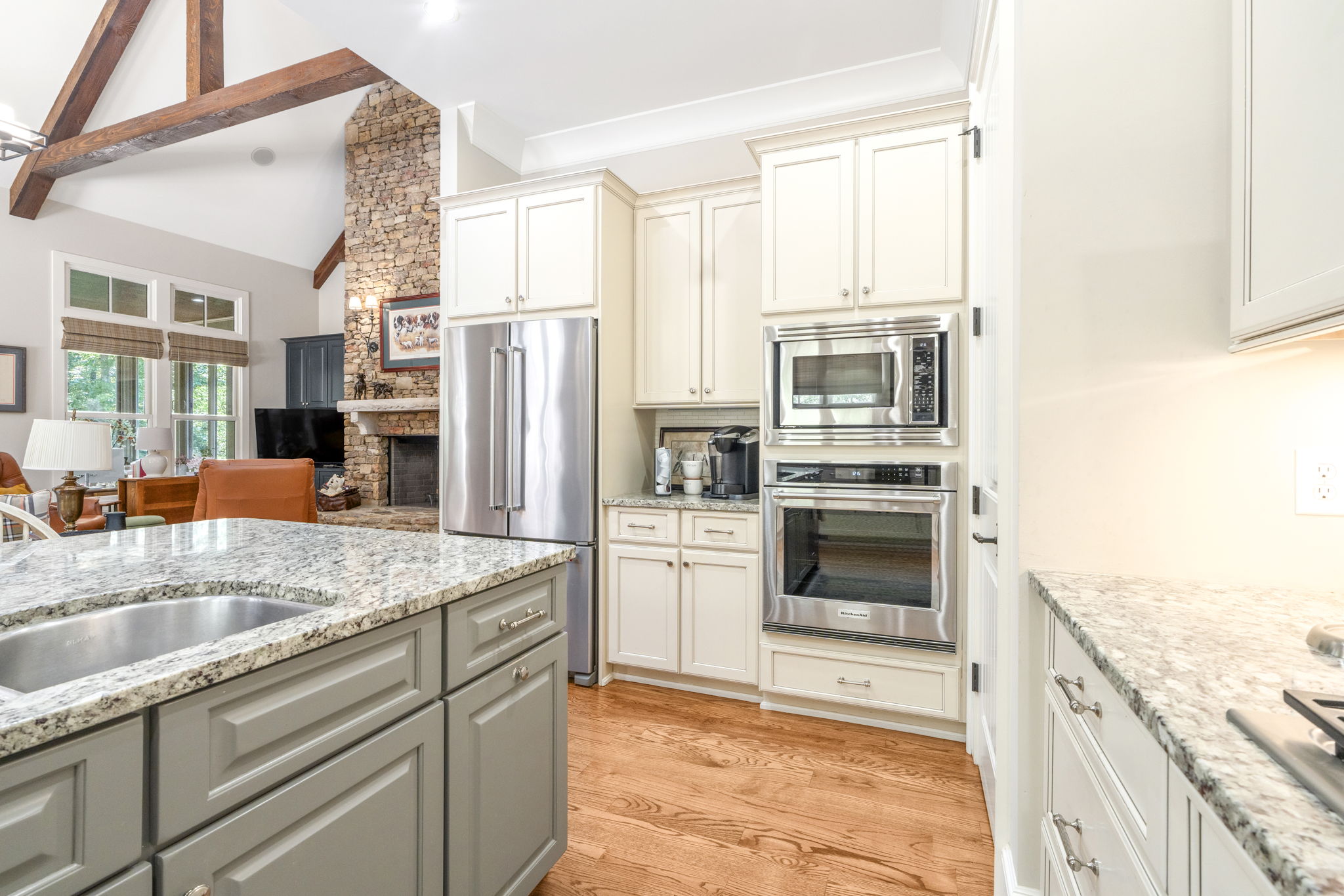 Kitchen with gas cooking and custom cabinetry