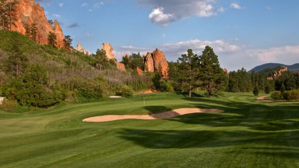 Woodmoor Country Club golf course with mountain panorama