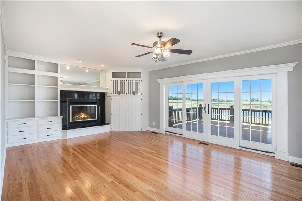 Living room with fireplace and built-ins