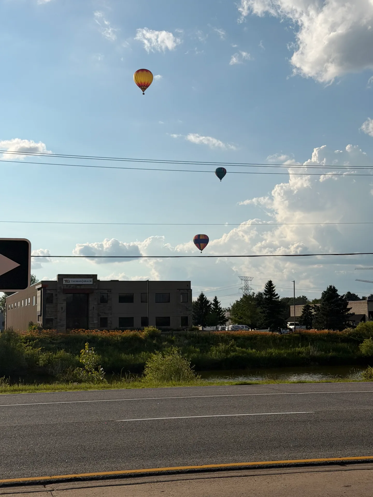 Hot air balloons rising over the St. Croix River valley during the Stillwater Hot Air Balloon Festival