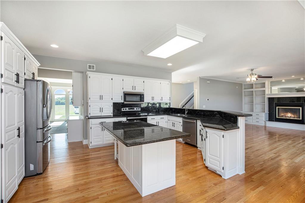 Kitchen opening to living area