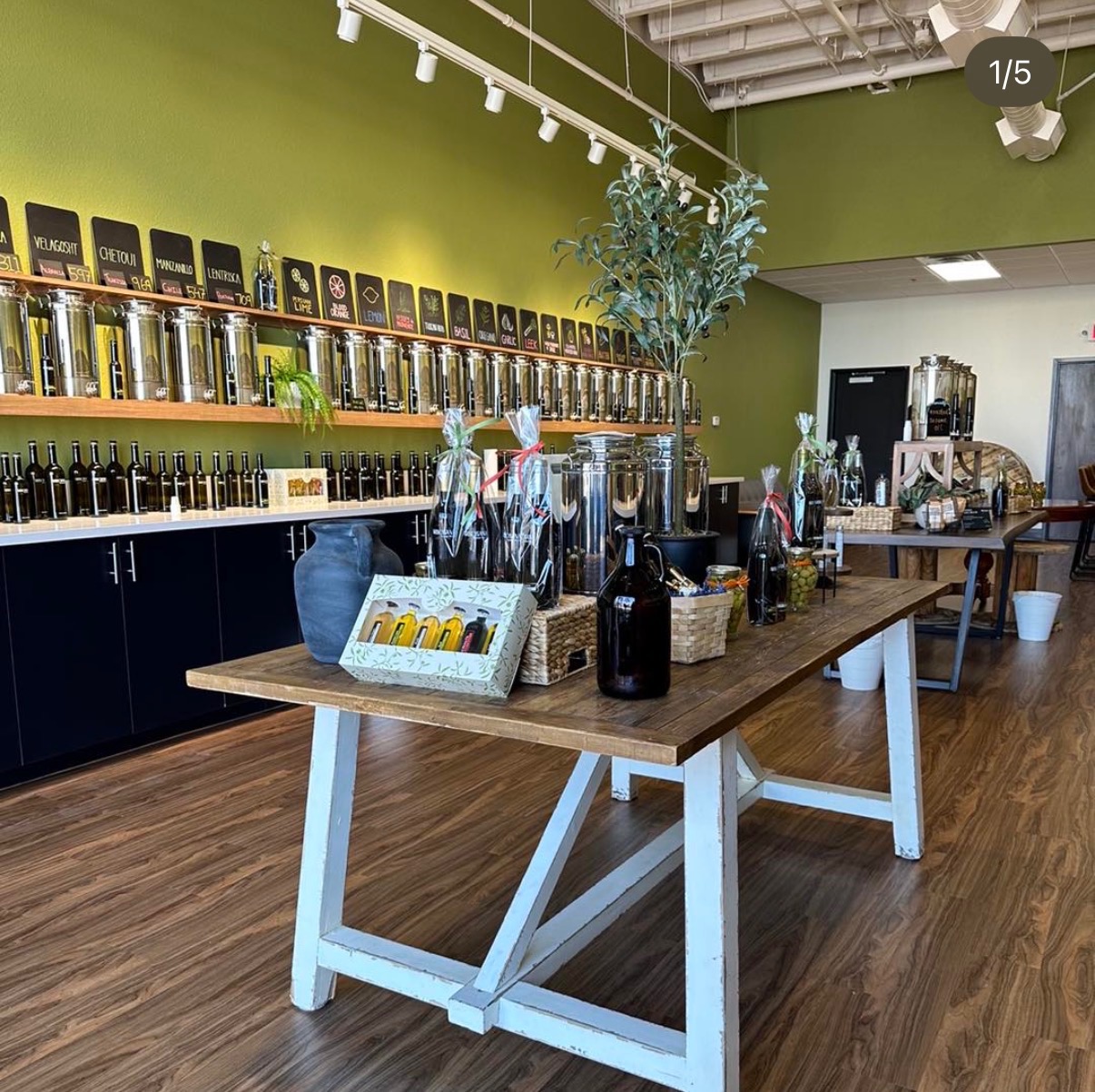 Tasting room at Arbosana Olive Oil in Summerlin with traditional fusti tanks for fresh-pressed olive oil