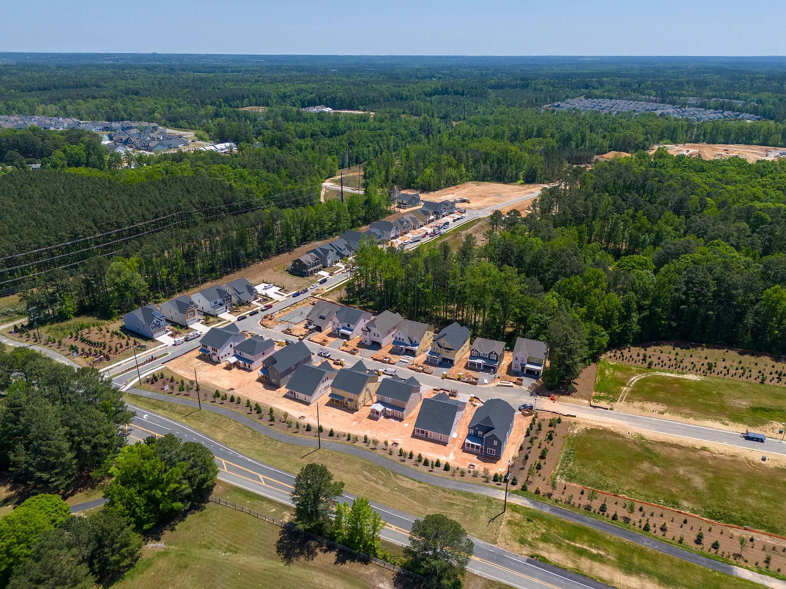 Aerial drone view of new construction homes in a Triangle neighborhood