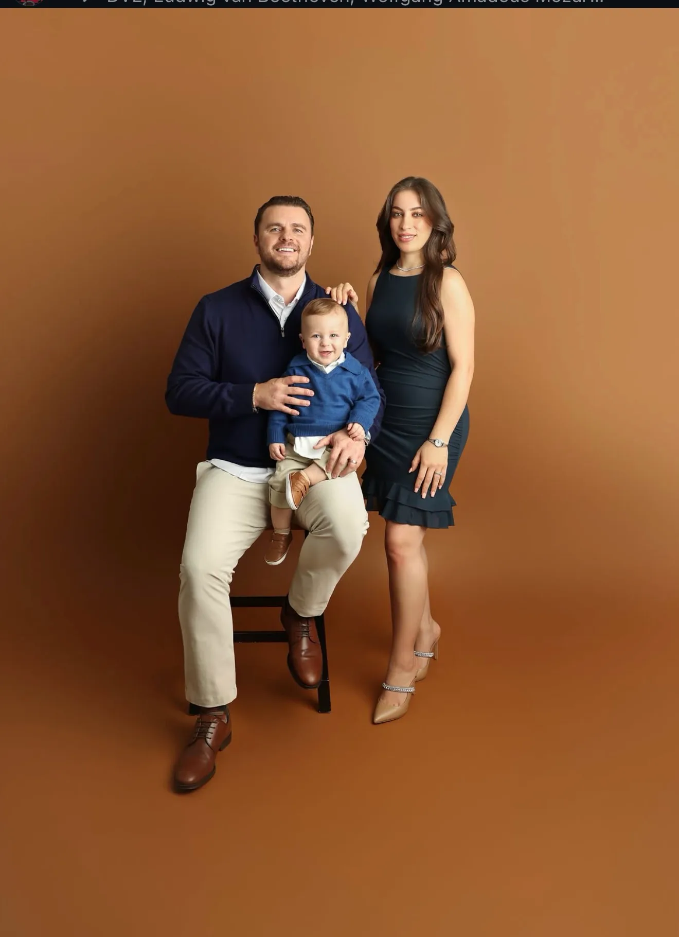Kladi Bejkolli together with his family