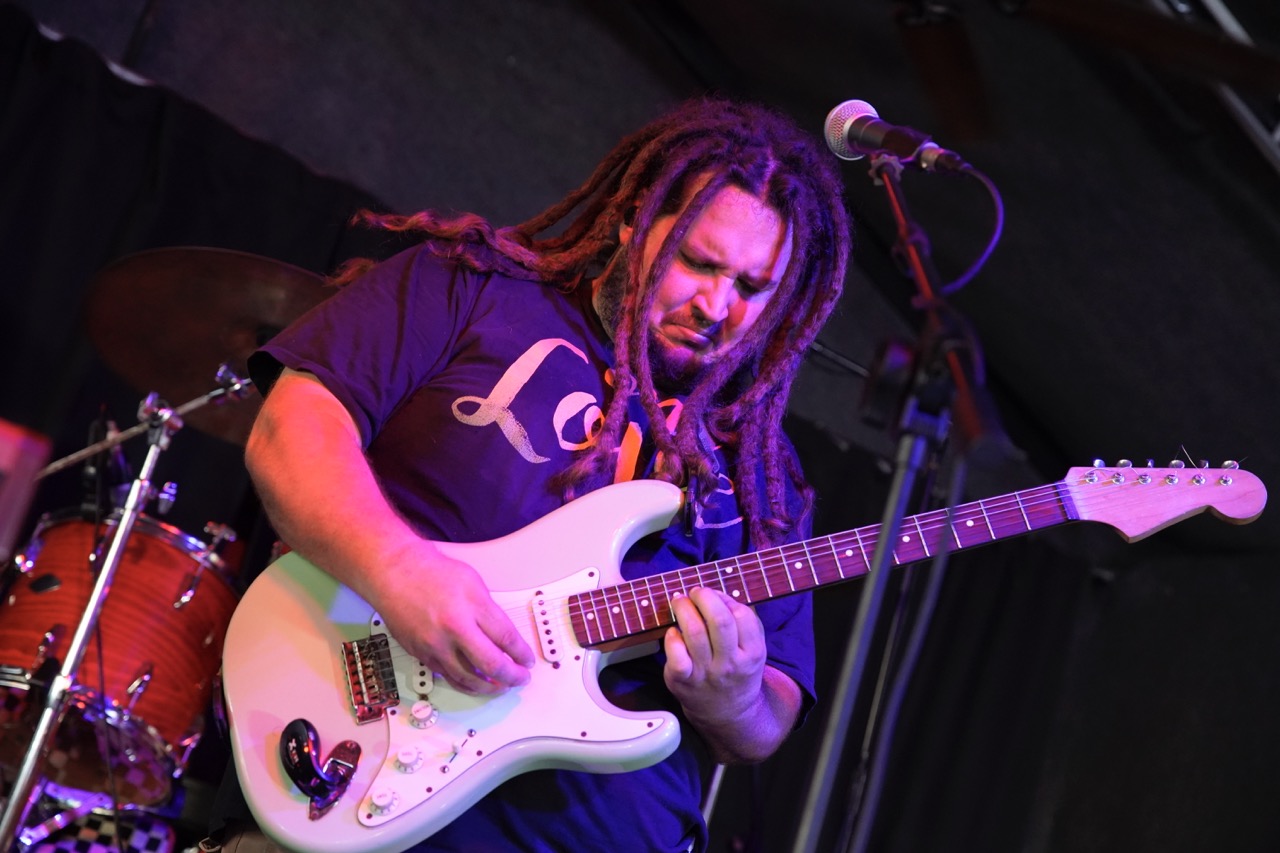 Reggae Lou and The Kind Budz performing live on stage at the Key West Theater