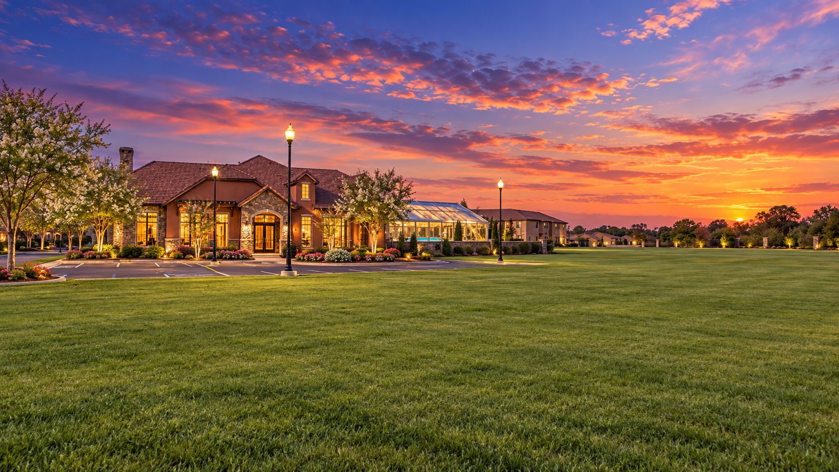 Eskaton Village Roseville Village Center clubhouse at sunset, viewed from the 55+ active adult community grounds