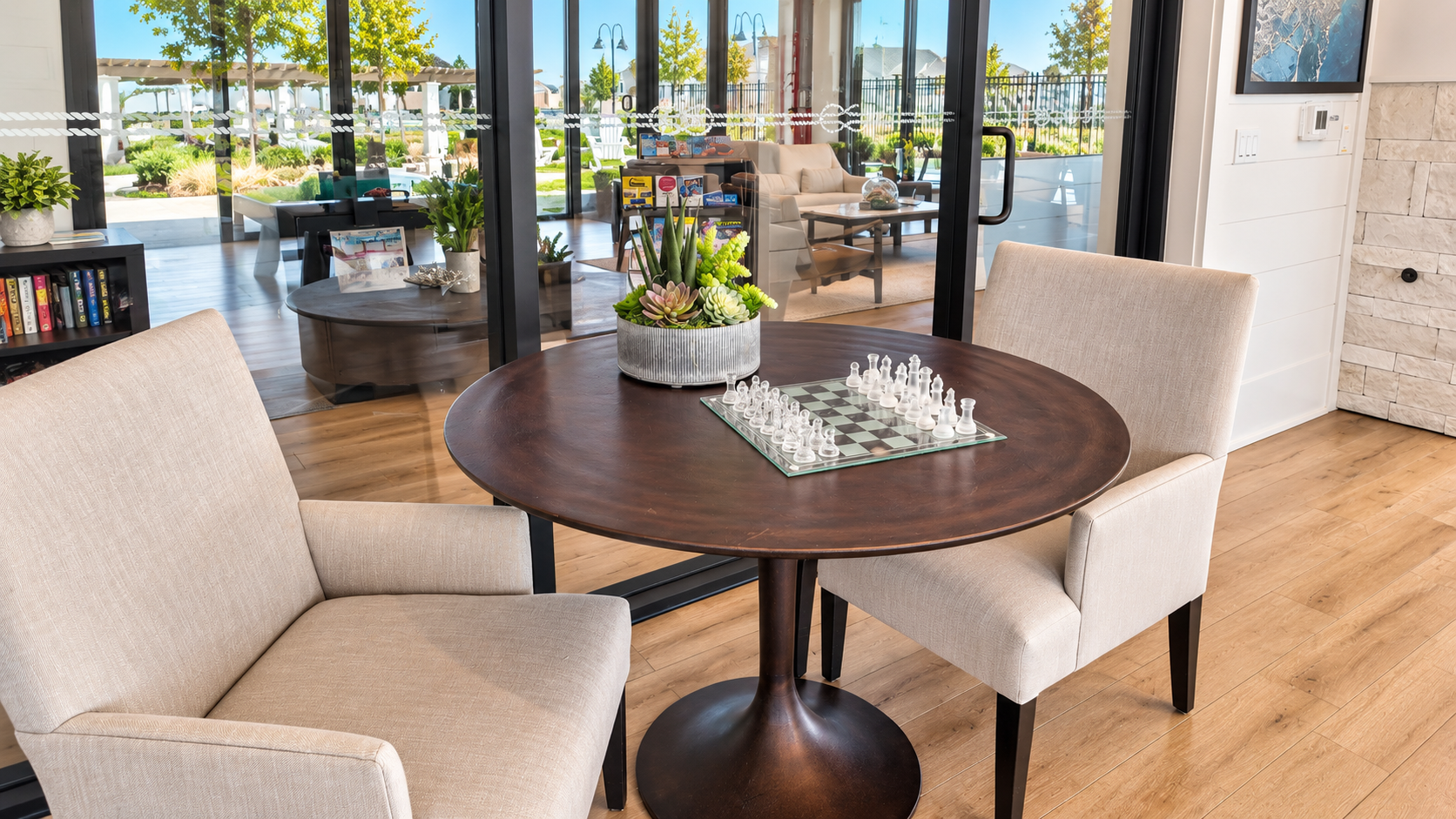 A glass chess set on a game table in the social lounge at Club Liberty, Summit at Liberty, Rio Vista