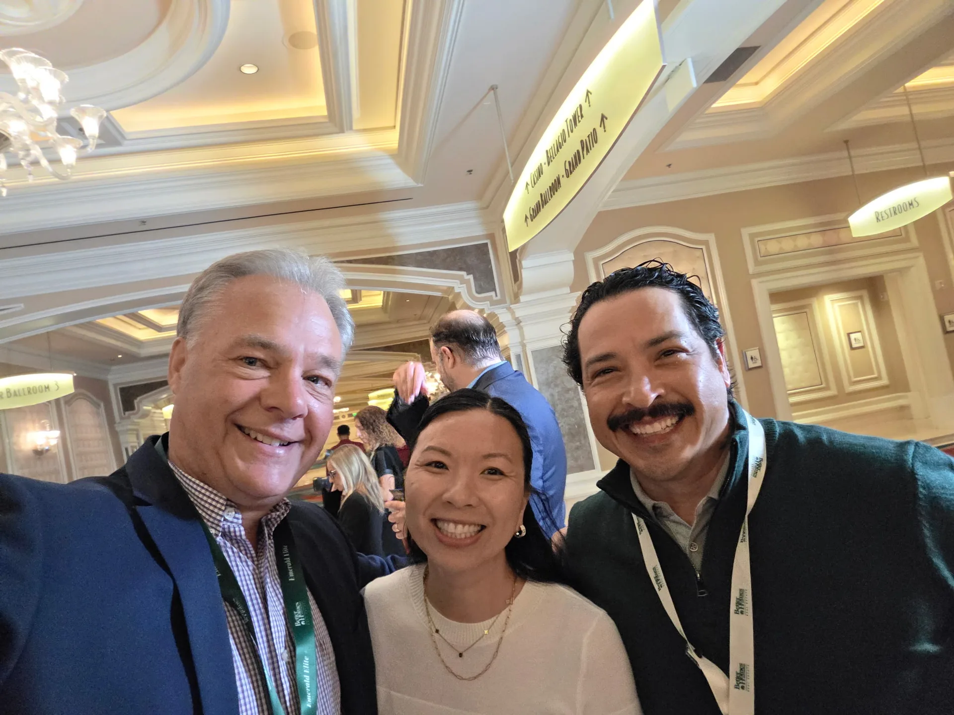 Three attendees take a group selfie at the Better Homes and Gardens Real Estate retreat in Las Vegas