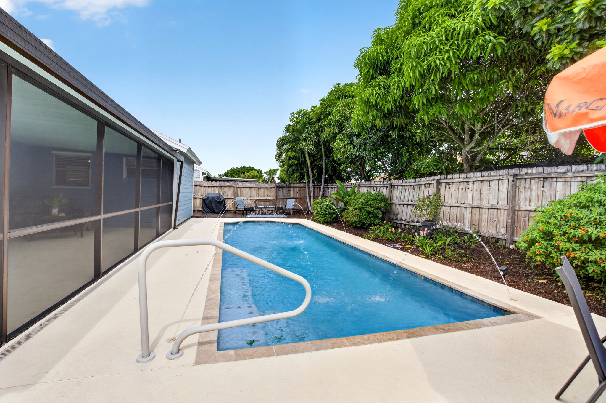 Exterior view of the just listed Lake Worth pool home