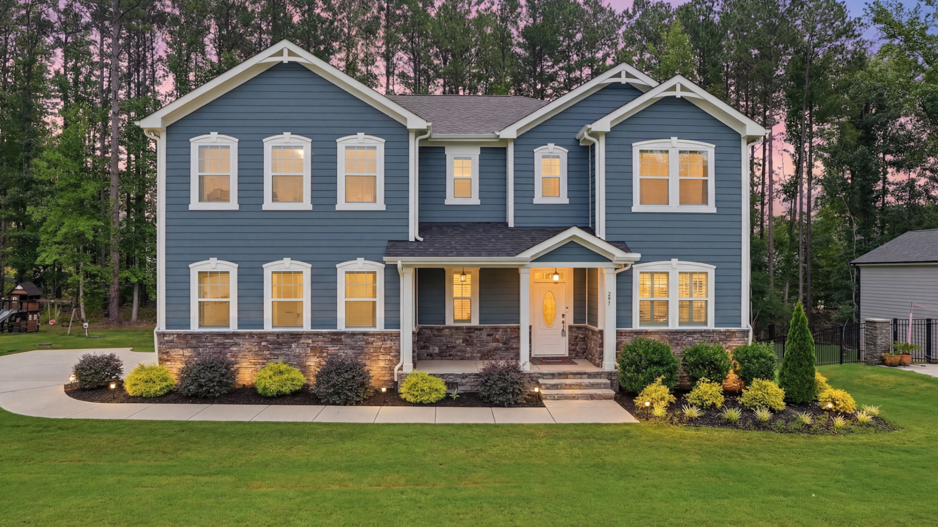 Front view of 297 Bonaventure Dr — luxury home in the Portofino community, Clayton NC