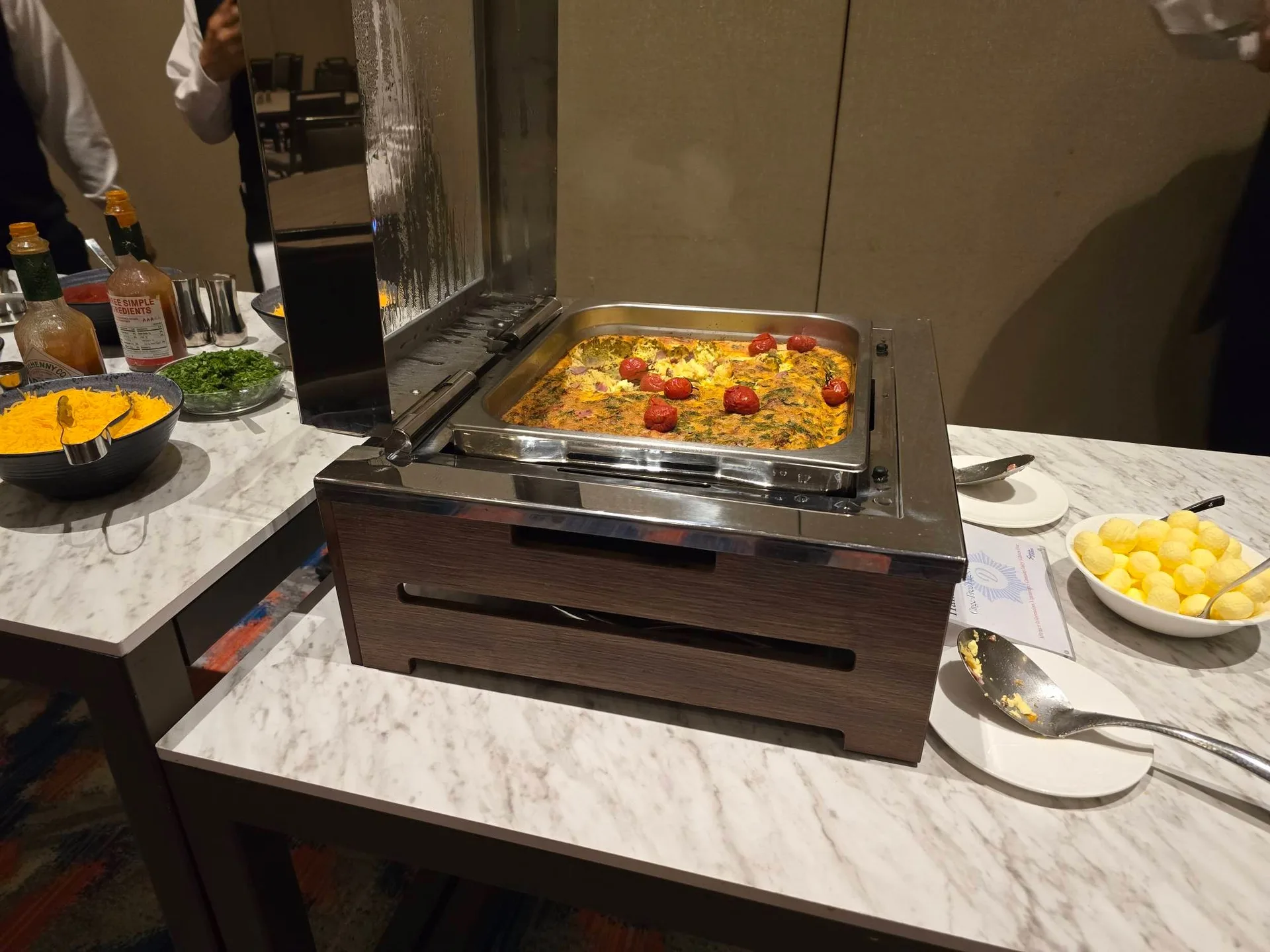 The hot buffet with a frittata-style dish at The Diplomat Beach Resort during the Mike Ferry 2026 Superstar Retreat in Hollywood, Florida