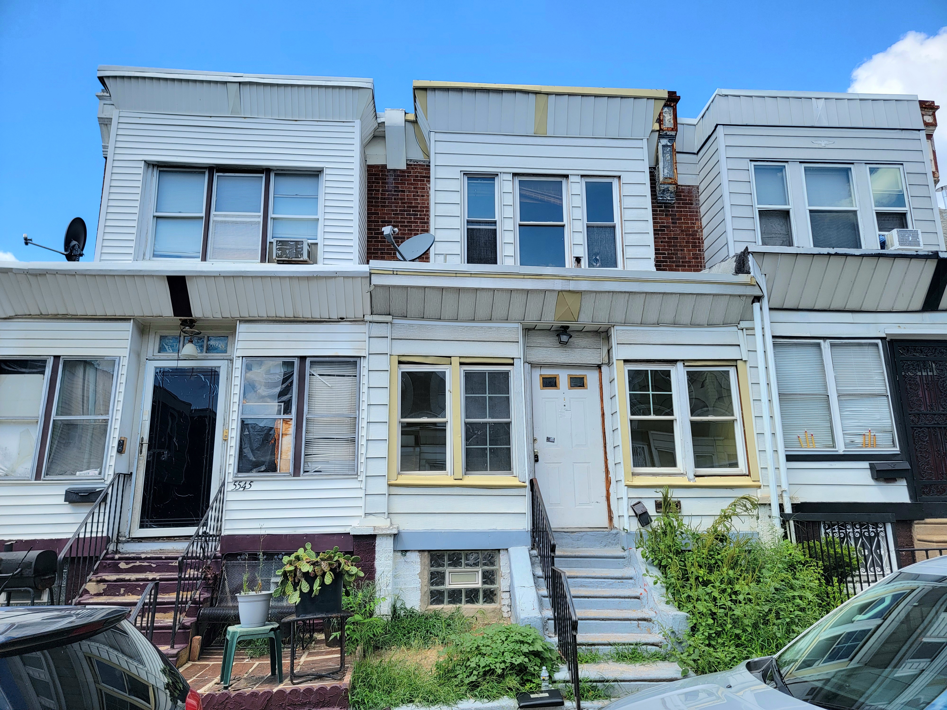 Brick townhouse at 5543 Malcolm St, Philadelphia
