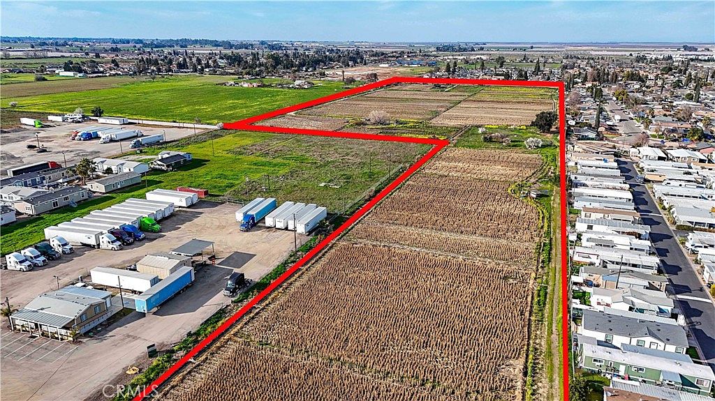 Drone view showing the property in relation to the surrounding area