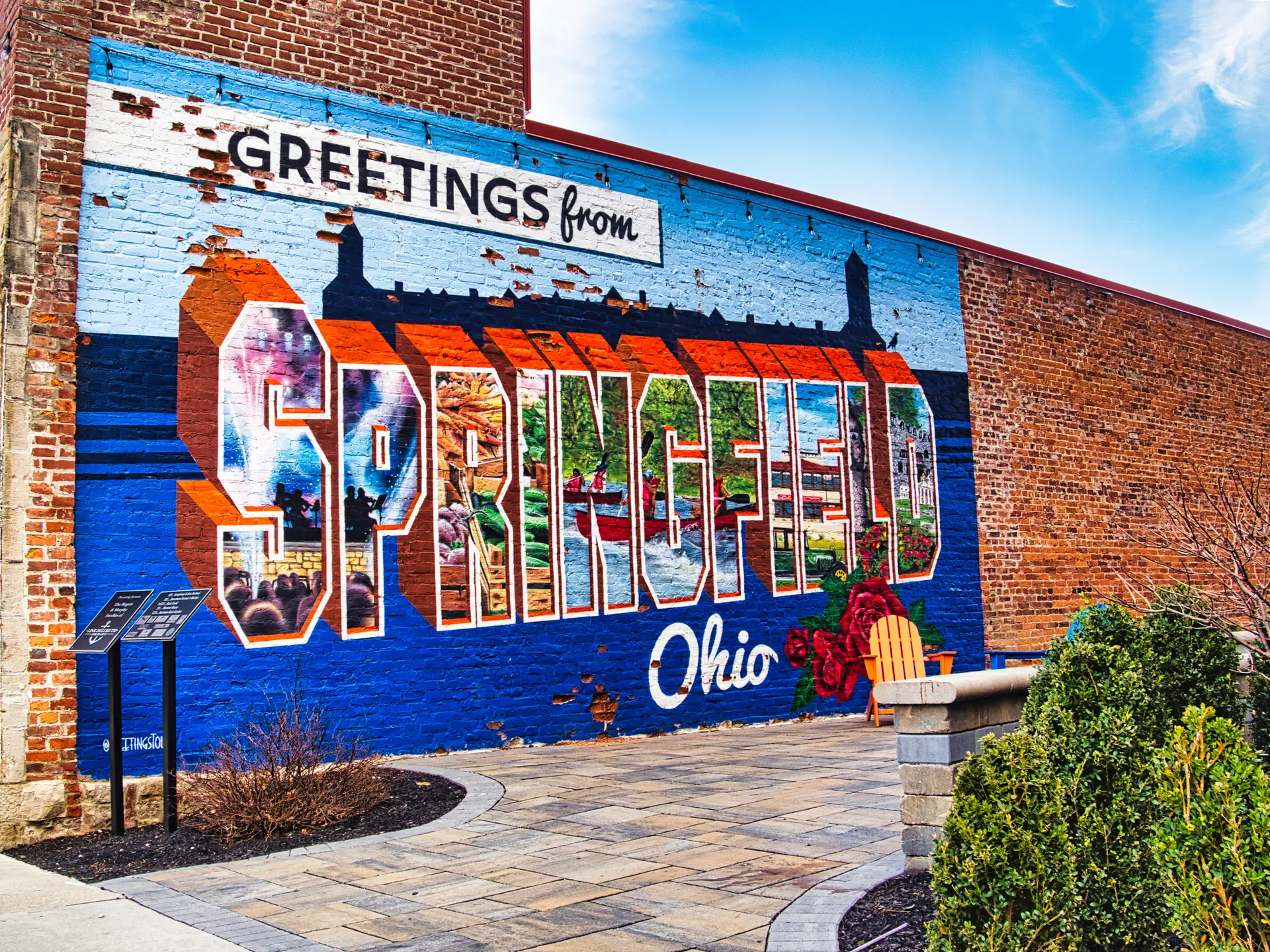 The Greetings from Springfield mural painted on a historic brick building in downtown Springfield, Ohio