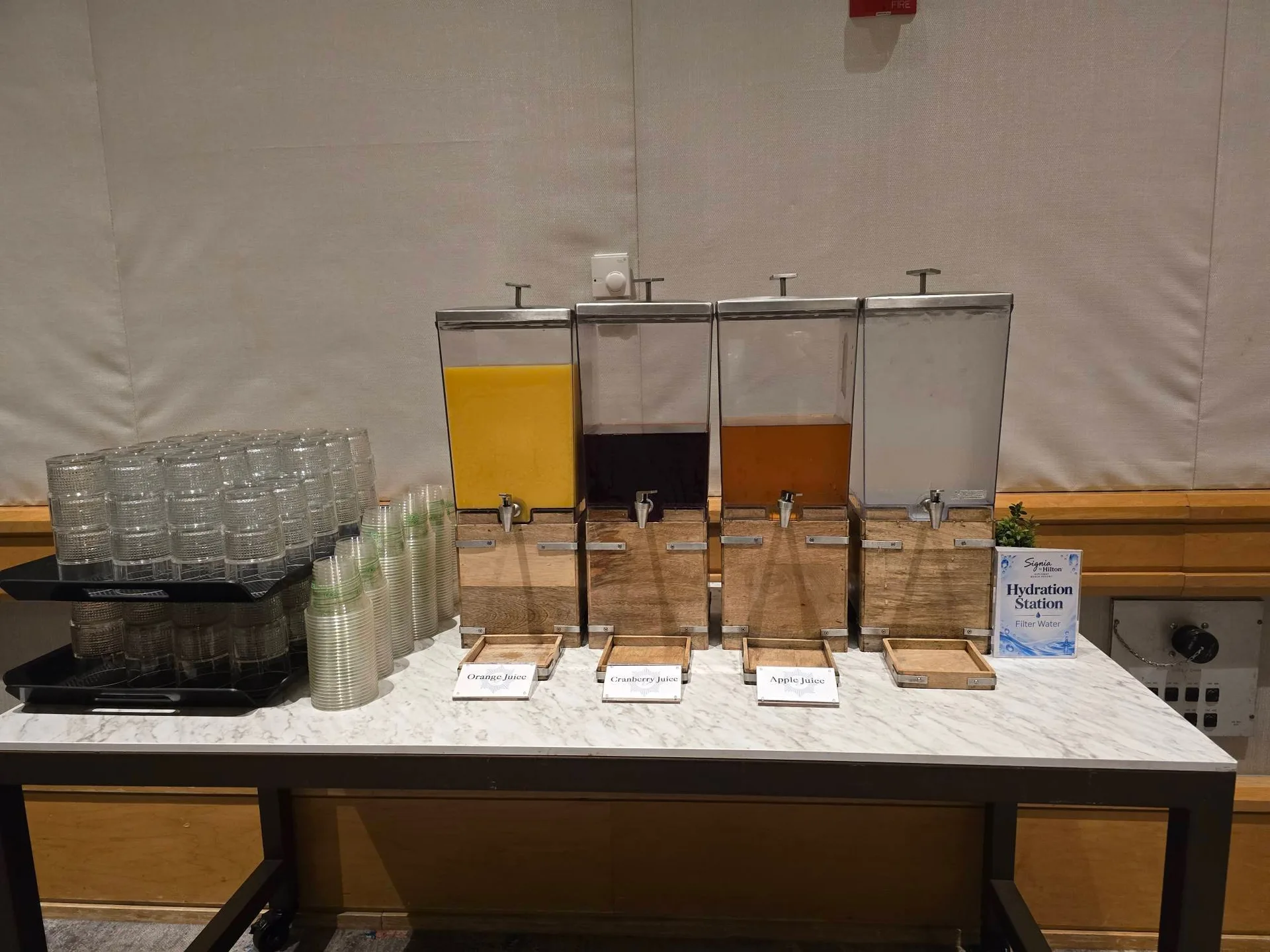 The hydration station with juice dispensers between sessions at the Mike Ferry 2026 Superstar Retreat at The Diplomat Beach Resort in Hollywood, Florida