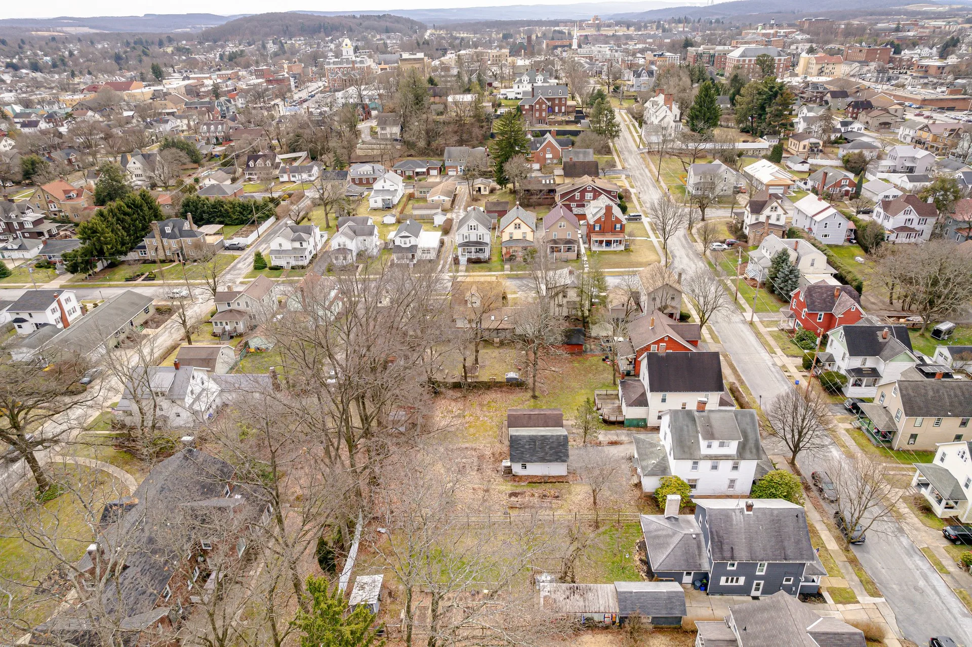 Aerial view of a residential neighborhood in Indiana, PA during winter