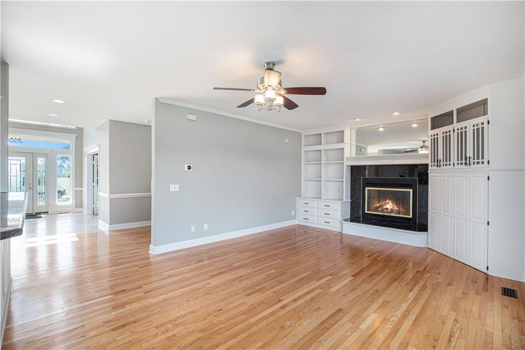 Family room with fireplace and hardwood