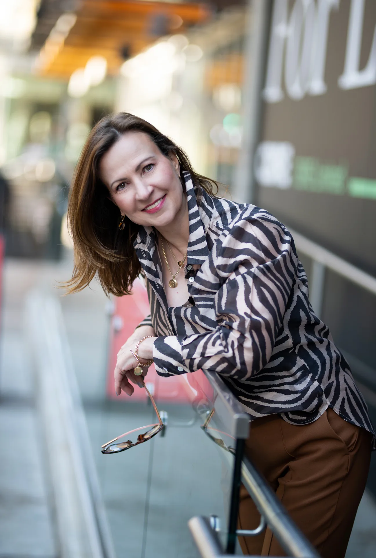 Svetlana, real estate professional with eXp Realty in Calgary, smiling warmly