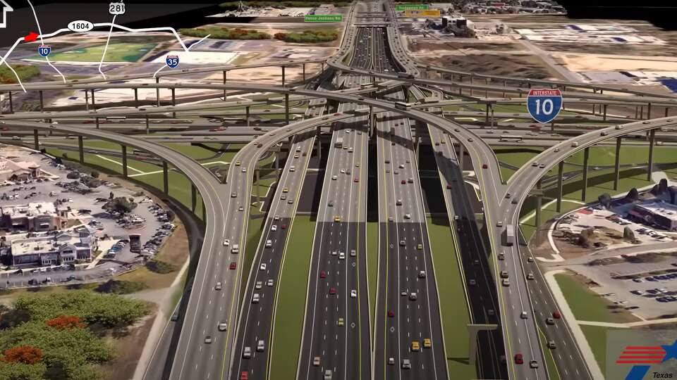 Aerial view of the I-10 and Loop 1604 interchange showing flyover ramps and construction progress in San Antonio, Texas