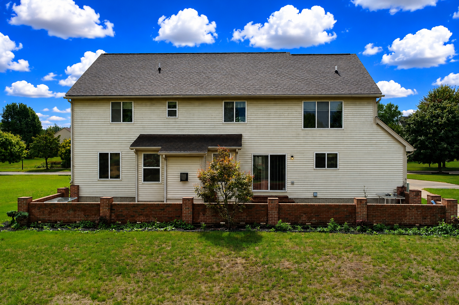 Back view of home at 2295 Hidden Forest Drive, Grand Blanc, Michigan