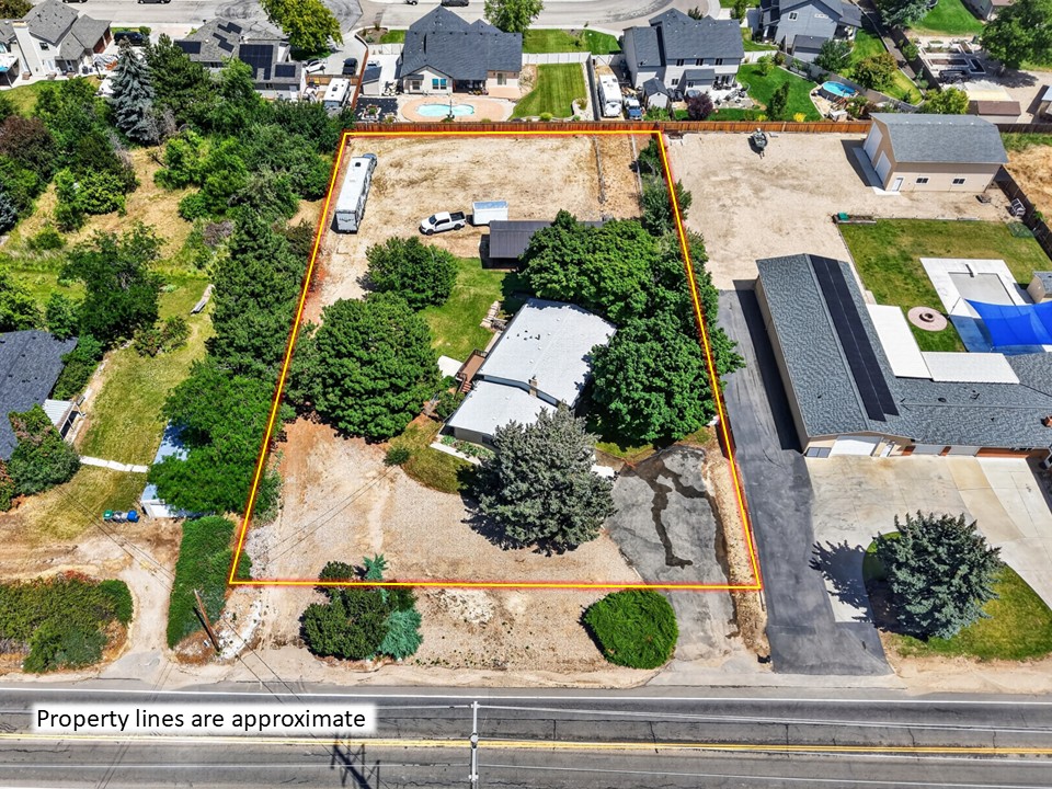 Aerial view of the 0.88-acre property at 2590 S Cloverdale Rd from the west
