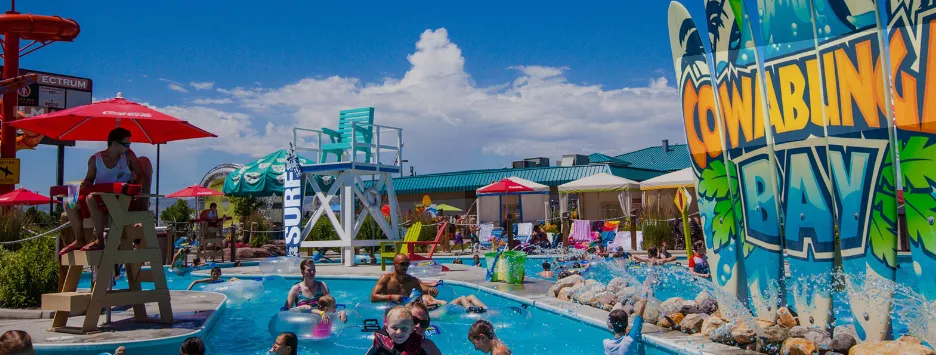 Families enjoying outdoor entertainment and attractions in Utah with mountain views in the background