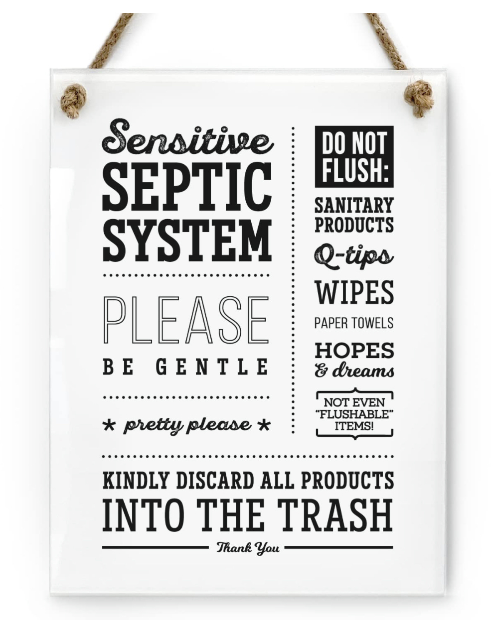 White bathroom sign listing items not to flush, including wipes and paper towels
