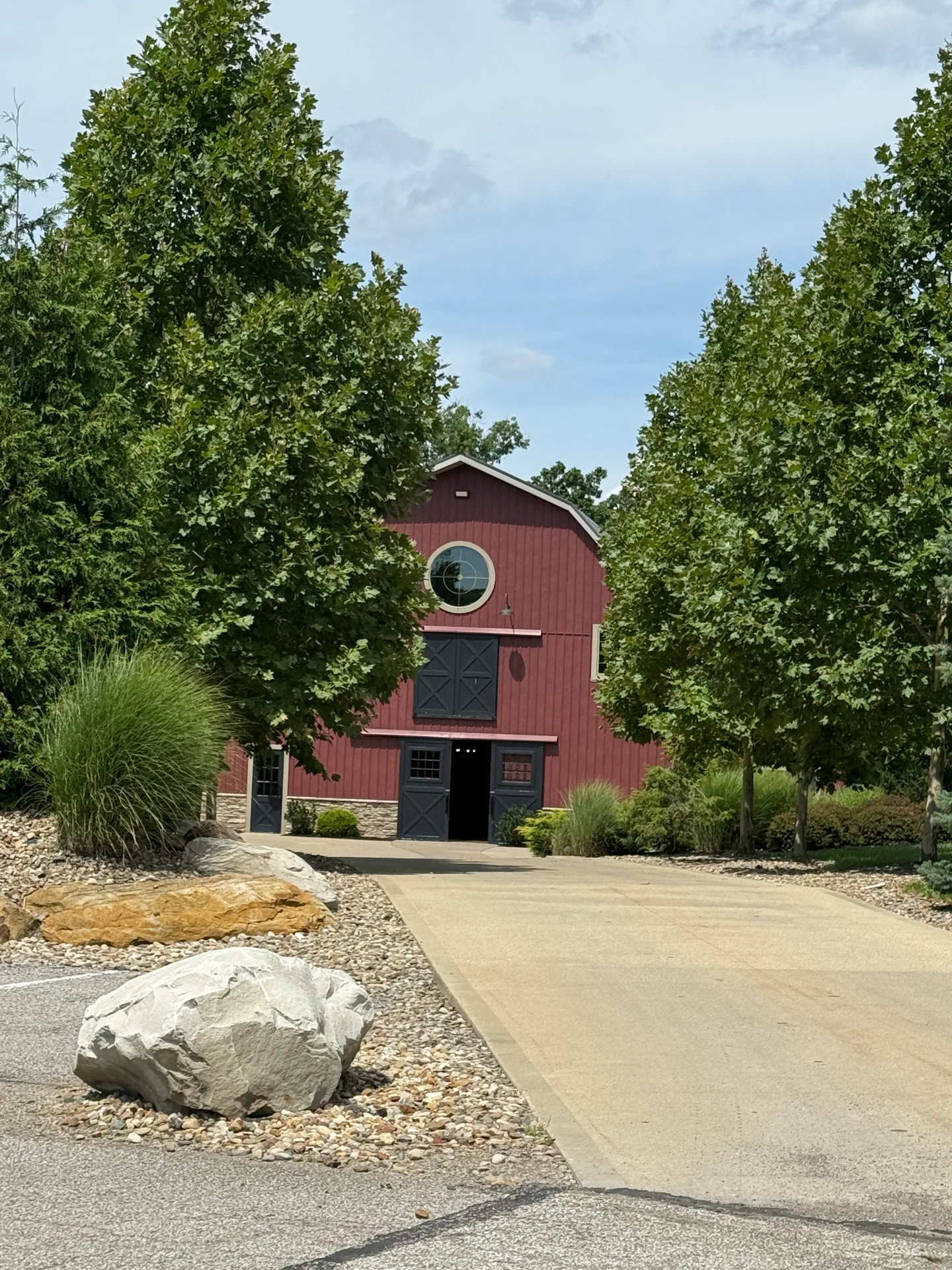 Barn from parking area with round window at Mapleside Farms in Brunswick, Ohio