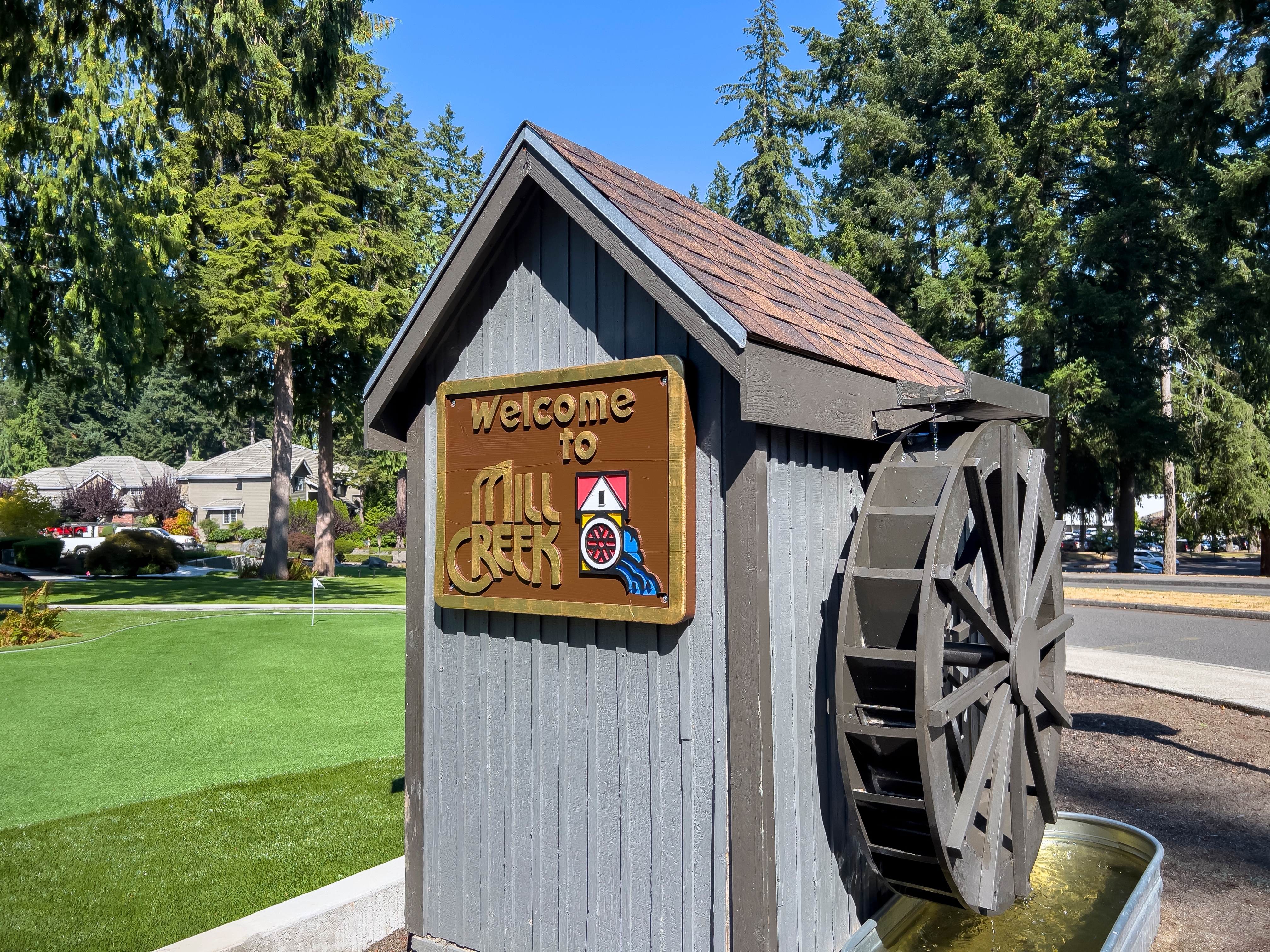The Welcome to Mill Creek sign, the landmark entrance marker greeting arrivals at the gateway into Mill Creek, Washington