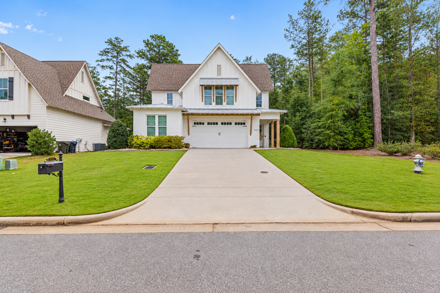 Front exterior of 1537 Dartmouth Dr, a modern farmhouse home in Auburn, AL