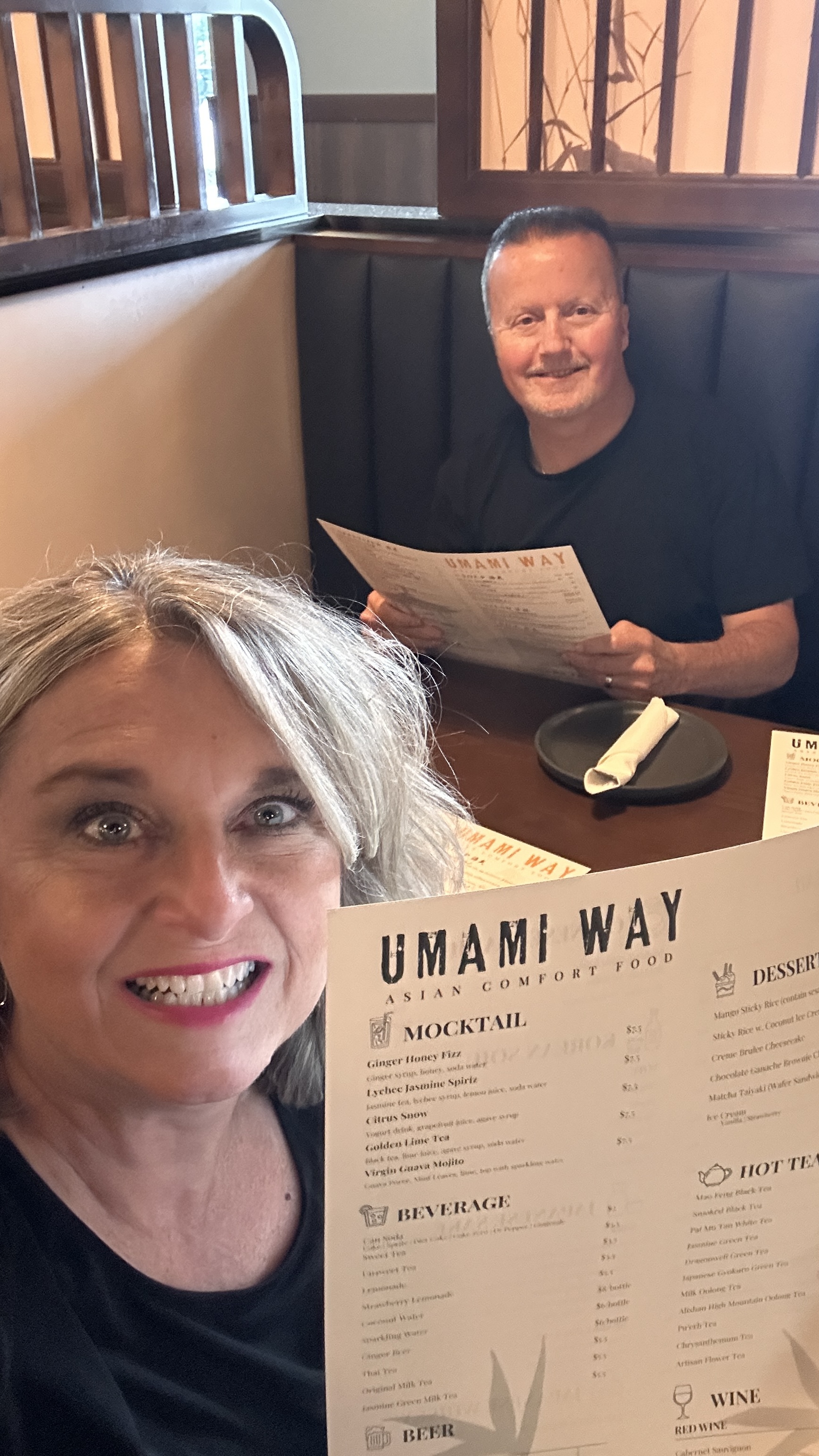 Stir-fried Asian entree over crispy noodles with rice at Umami Way in Braselton Georgia