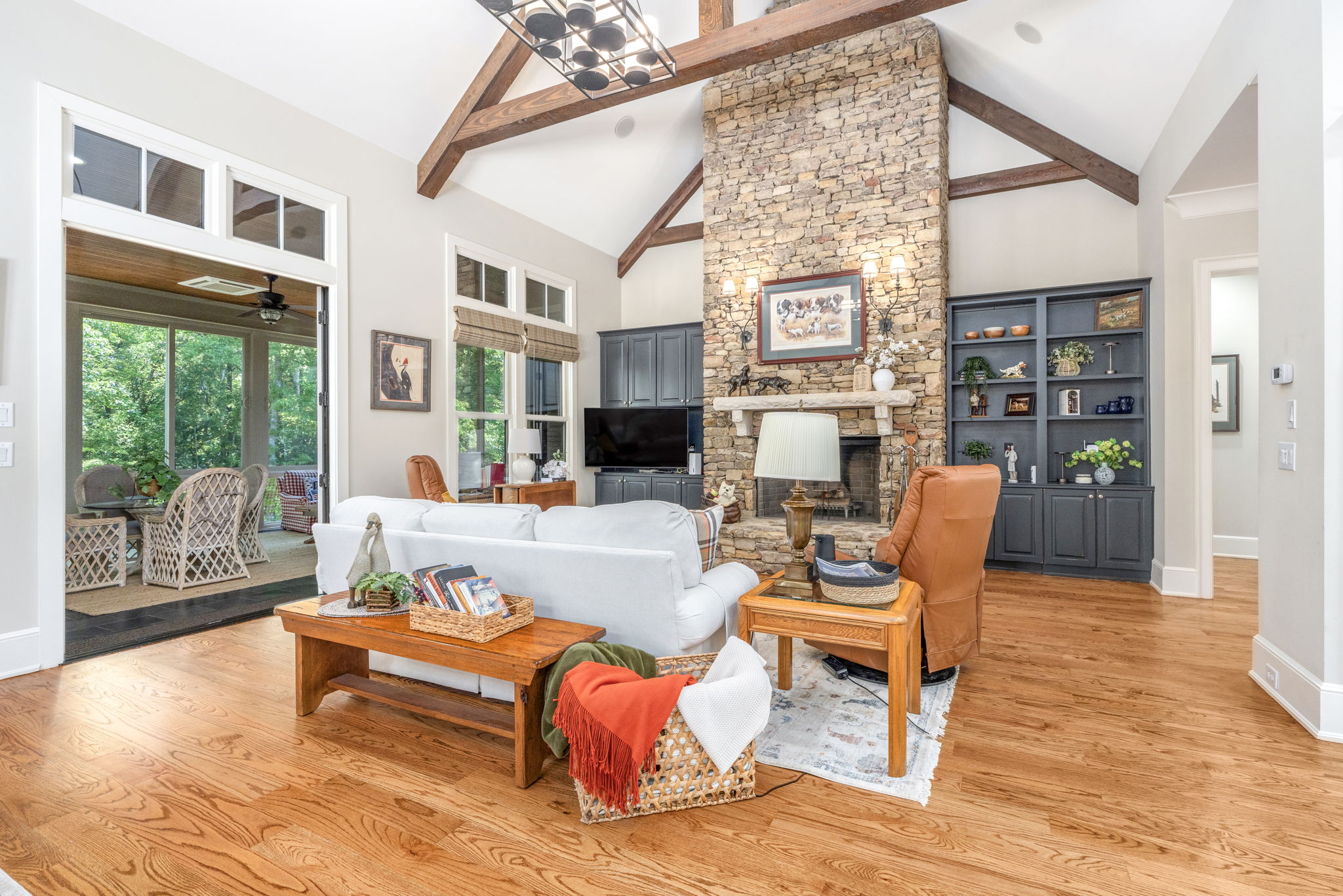 Living room with fireplace and vaulted ceilings