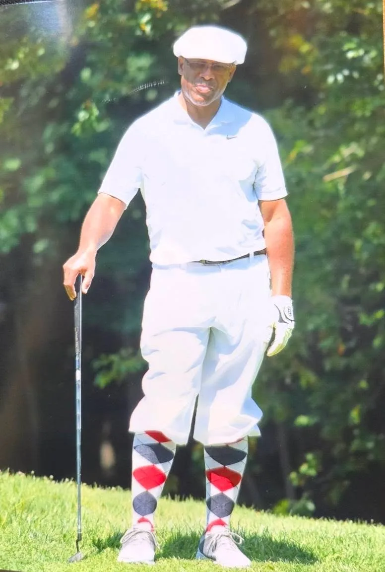 A golfer wearing classic Knickerbocker-style knickers and argyle socks at the 82nd Annual Knickerbocker Golf Club Scholarship Tournament