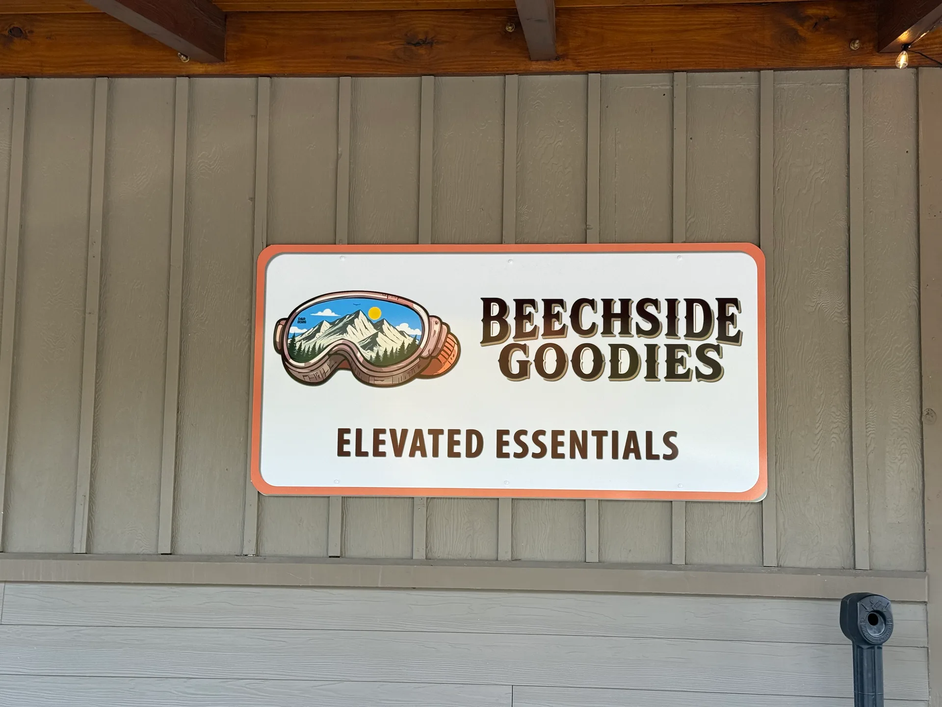 The Beechside Goodies Elevated Essentials sign outside the Alpine Ski Center
