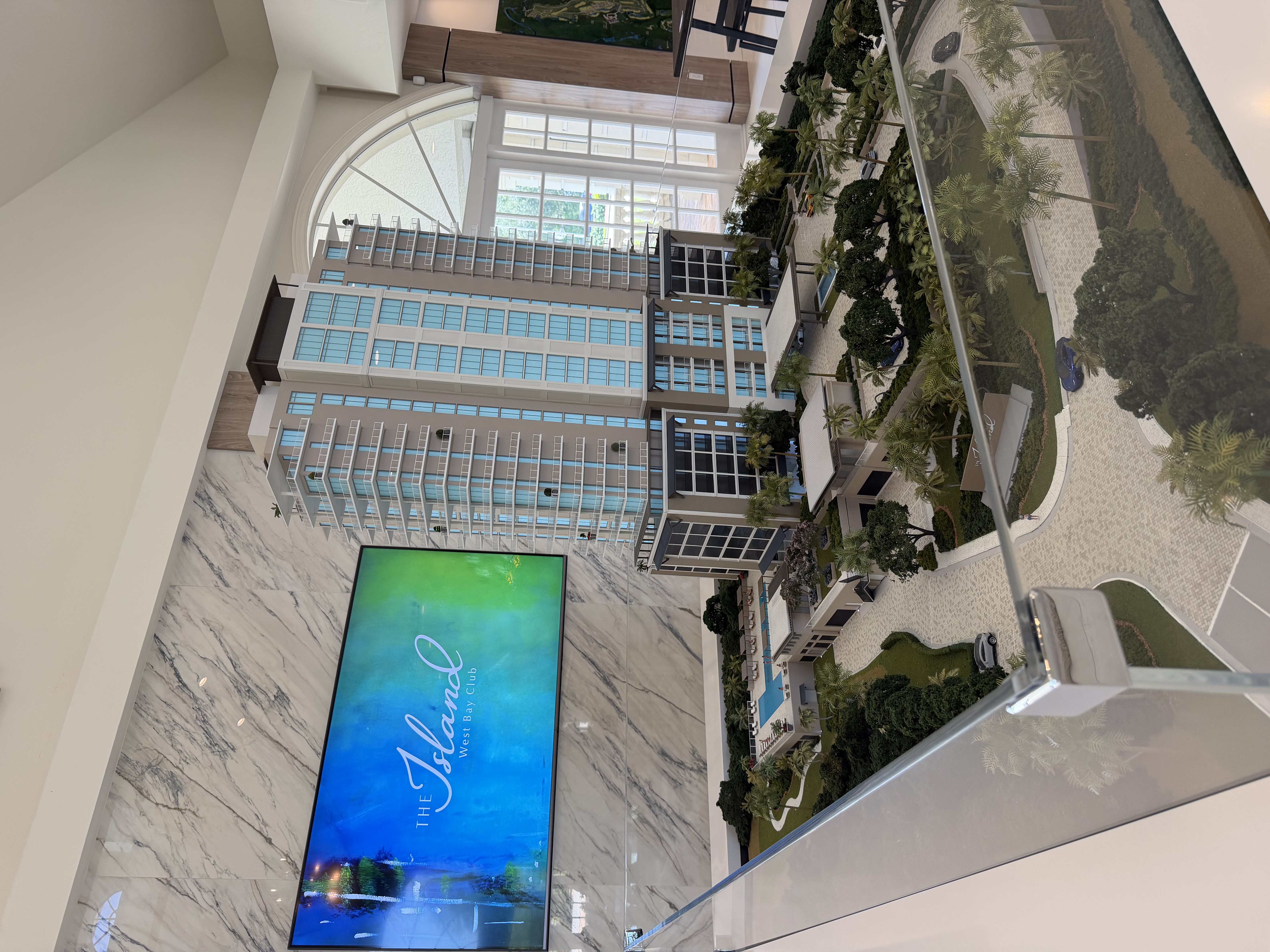 Lake views and water features within the West Bay Club community