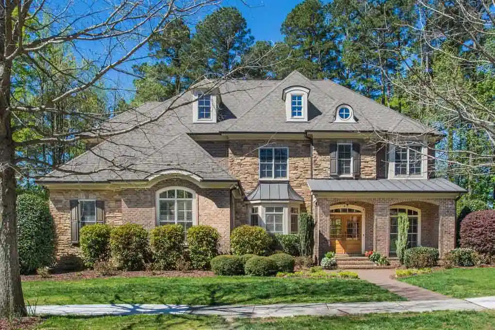 Bedford at Falls River neighborhood home in North Raleigh with colorful exterior and front porch