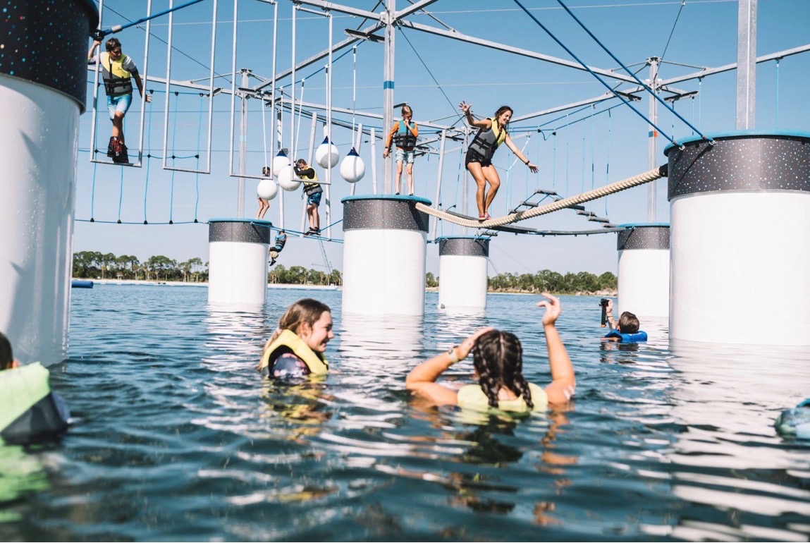 Sunwest Park adventure activities with Aqua Tower and floating obstacle course on the Gulf