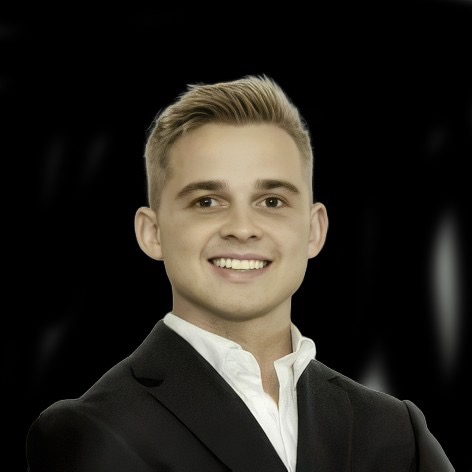 Professional headshot of Donald Adams