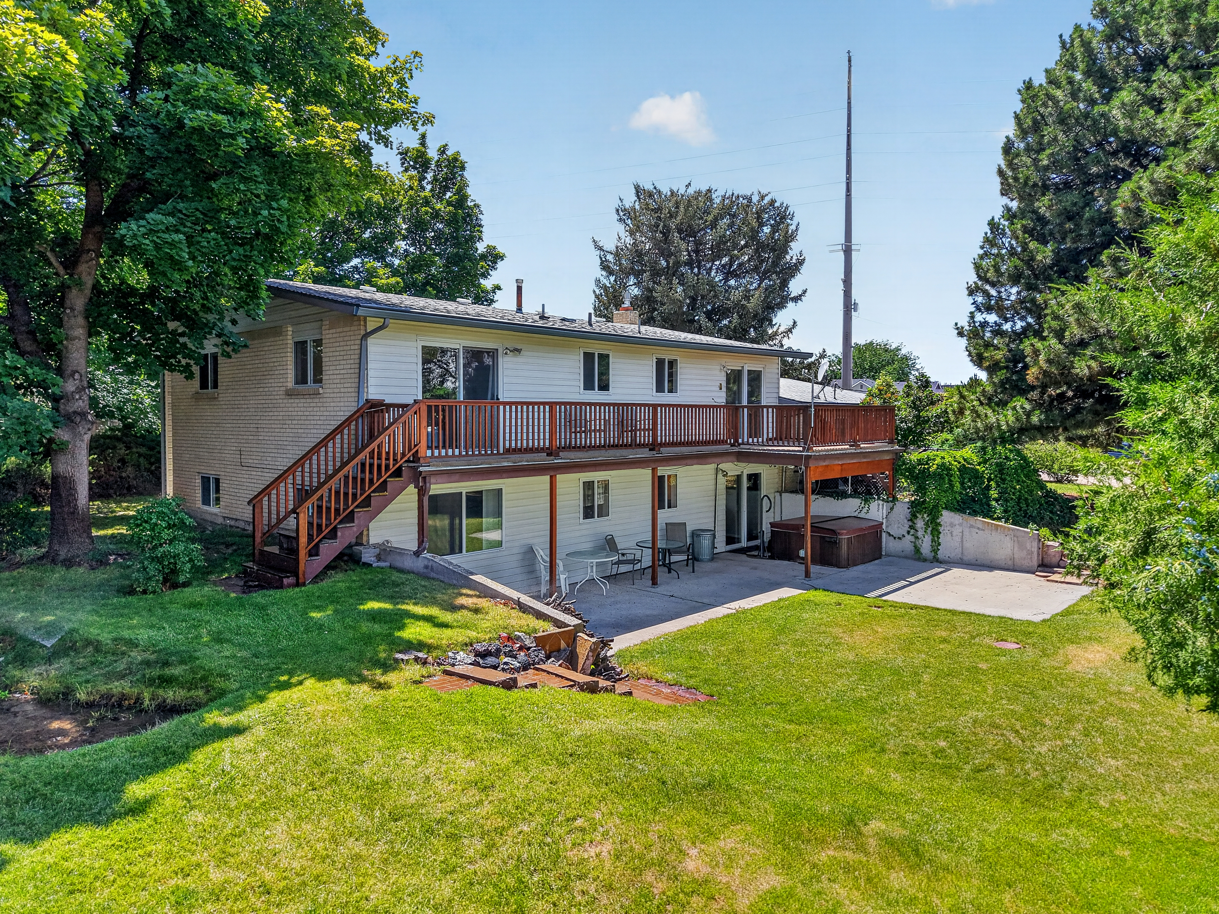 Spacious backyard at 2590 S Cloverdale Rd in Boise, Idaho showing the open acreage and outdoor living space
