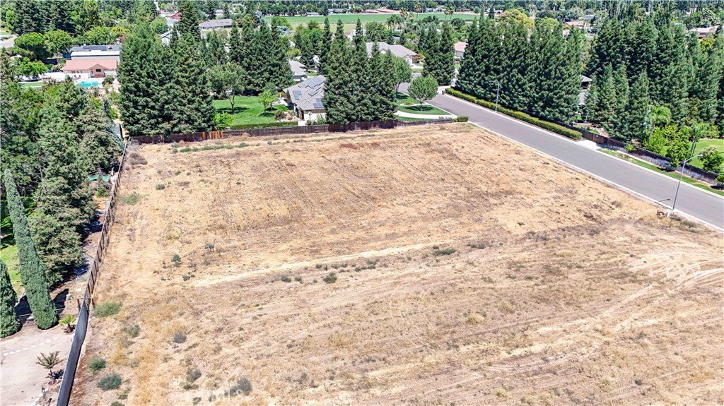 Panoramic view of the rectangular lot at 1371 Shady Cove Ave showing the full acre of land