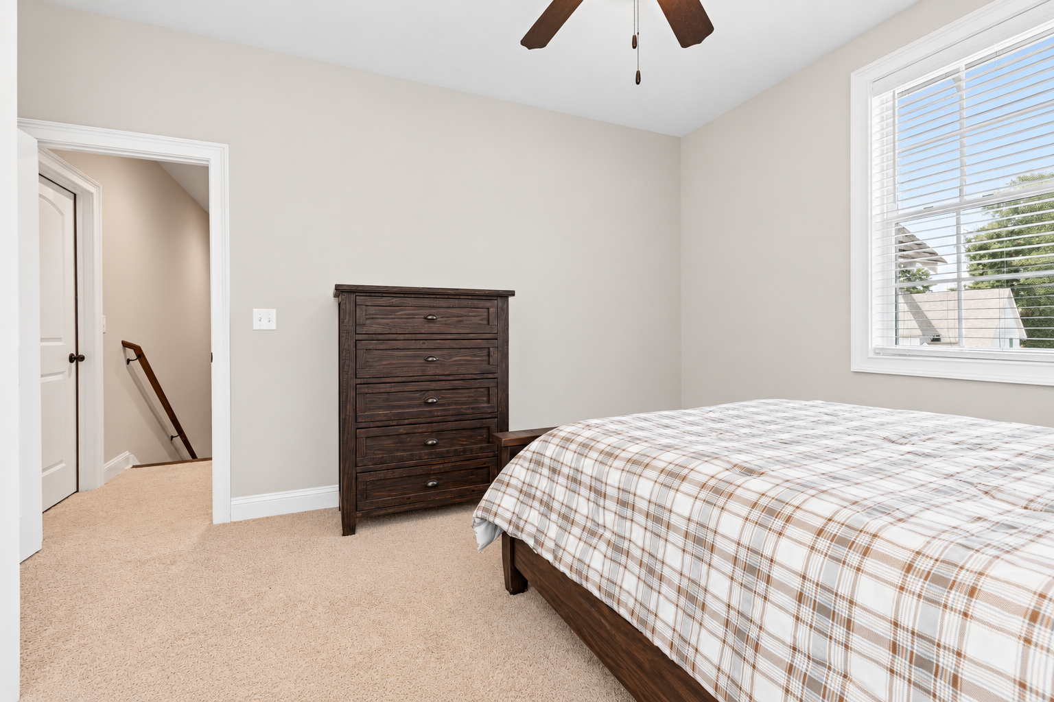 Bright neutral bedroom at 1537 Dartmouth Dr, Auburn AL