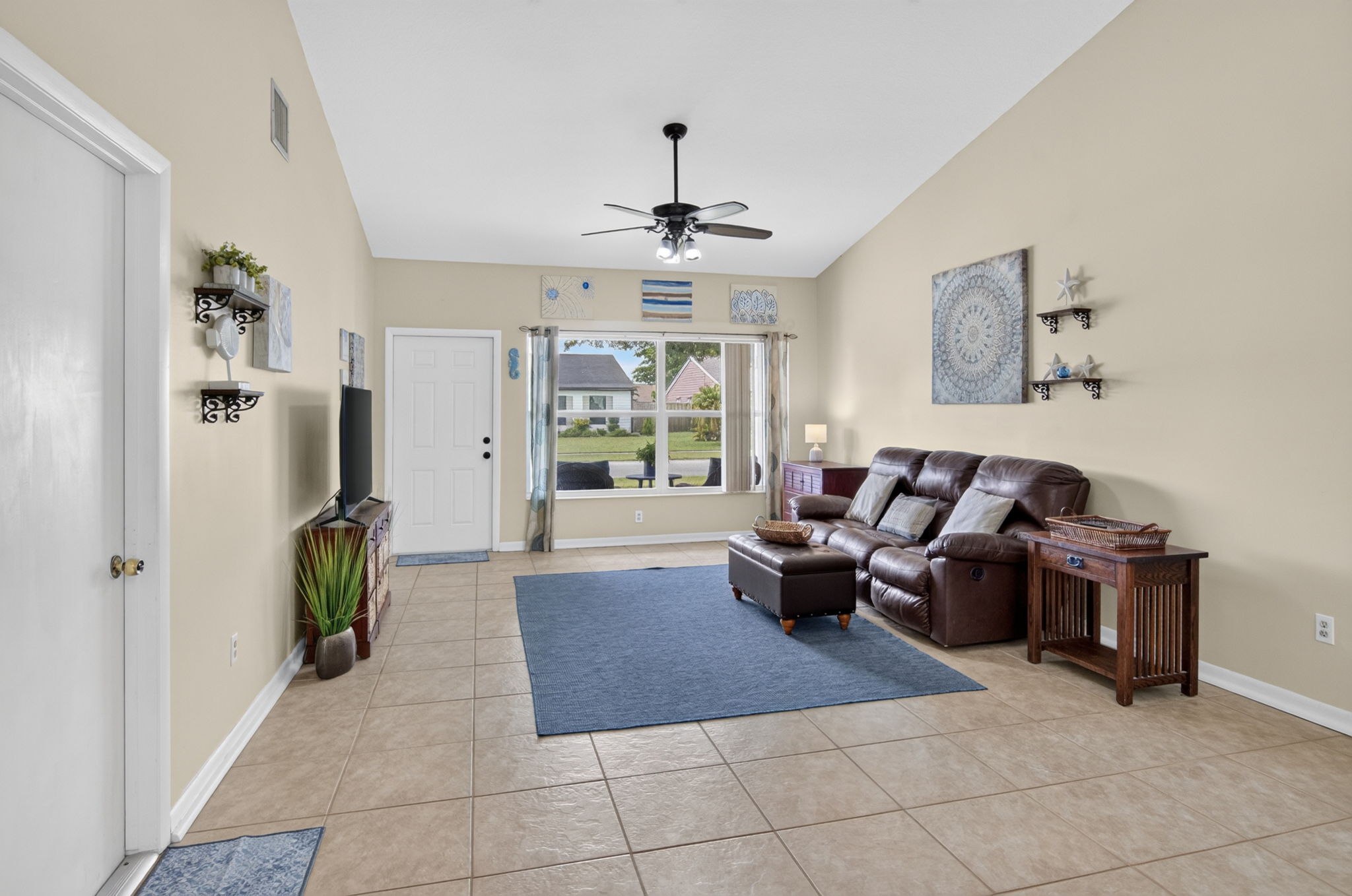 Kitchen with black stainless steel appliances at the Lake Worth pool home