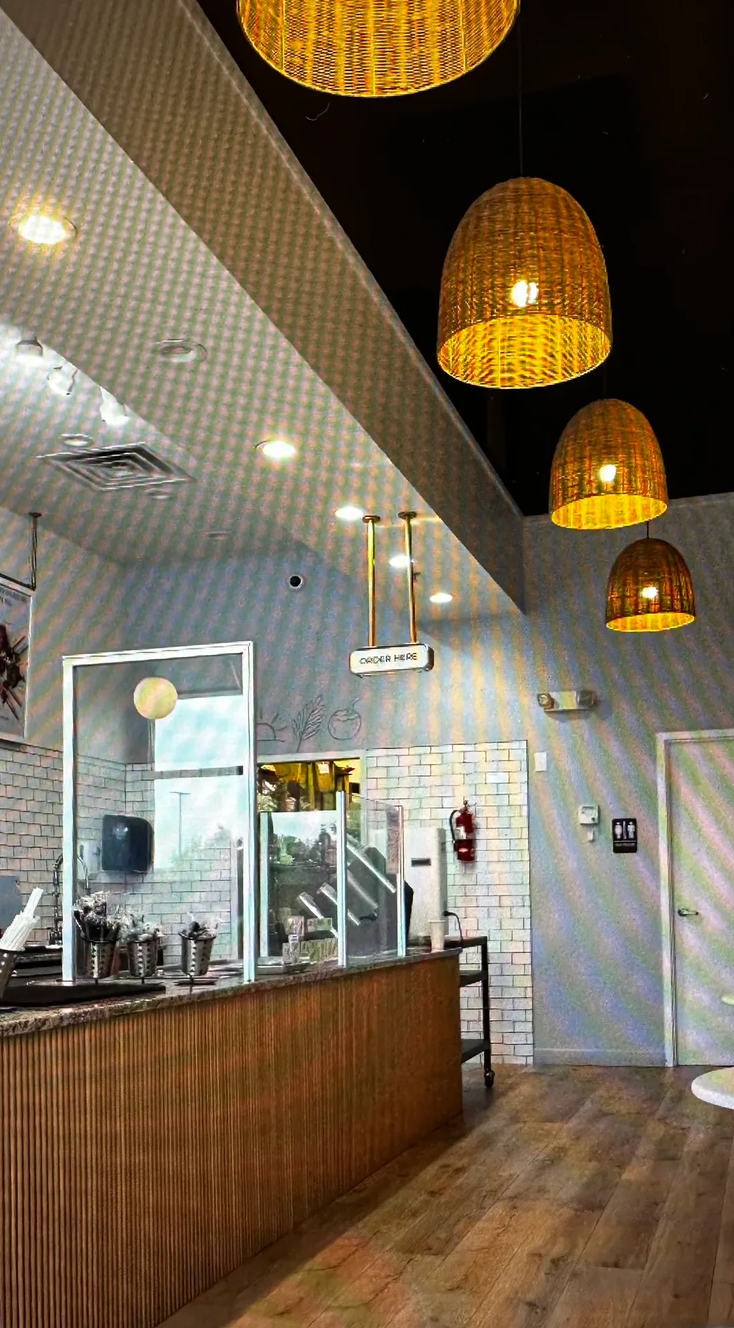 The bright order and seating area inside The Daily Blend at Lexington Square in Lexington, SC