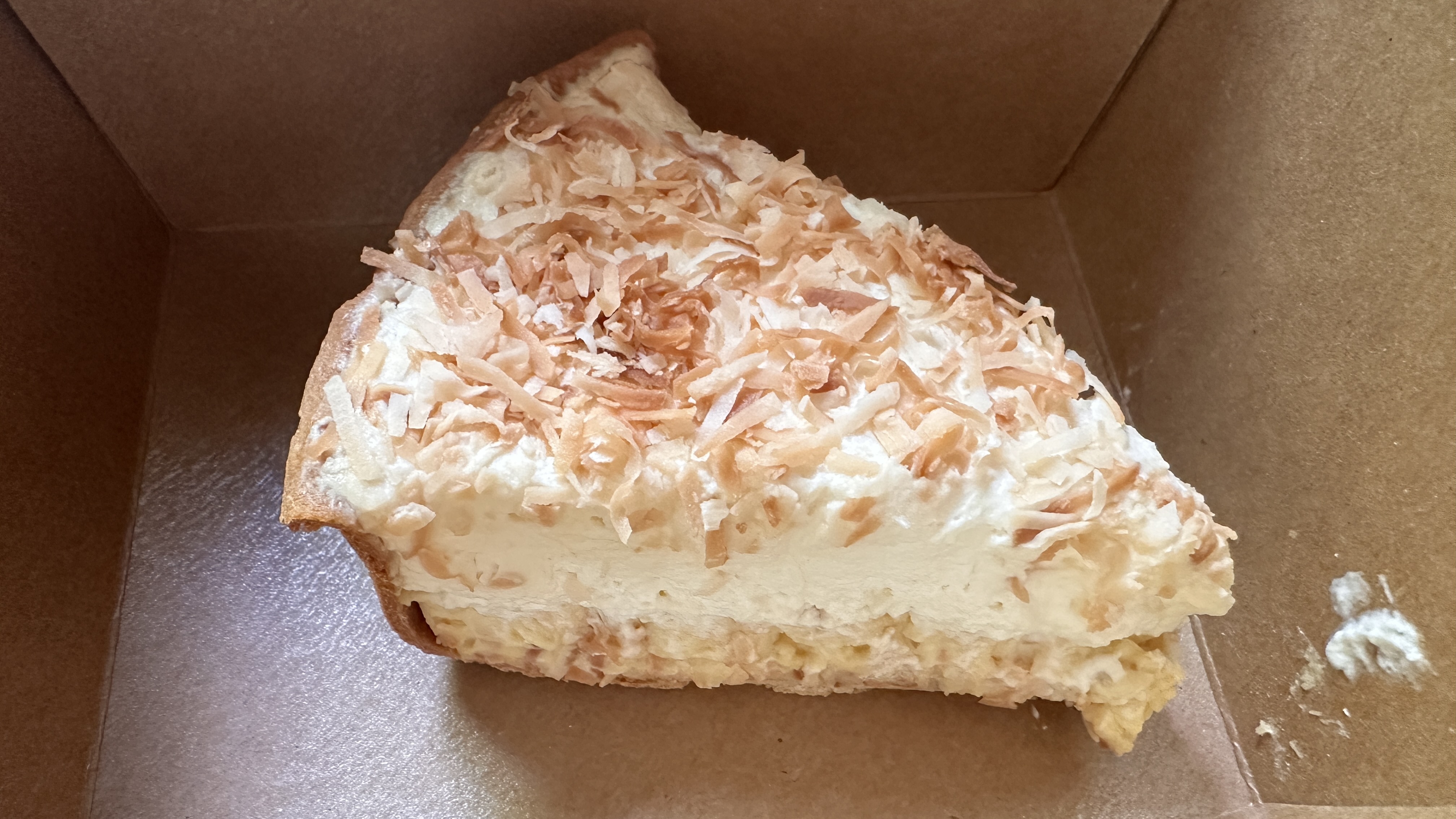 Coconut cream pie slice, Lisa's favorite dessert at Uncle Jack's Meat Market in Duluth Georgia