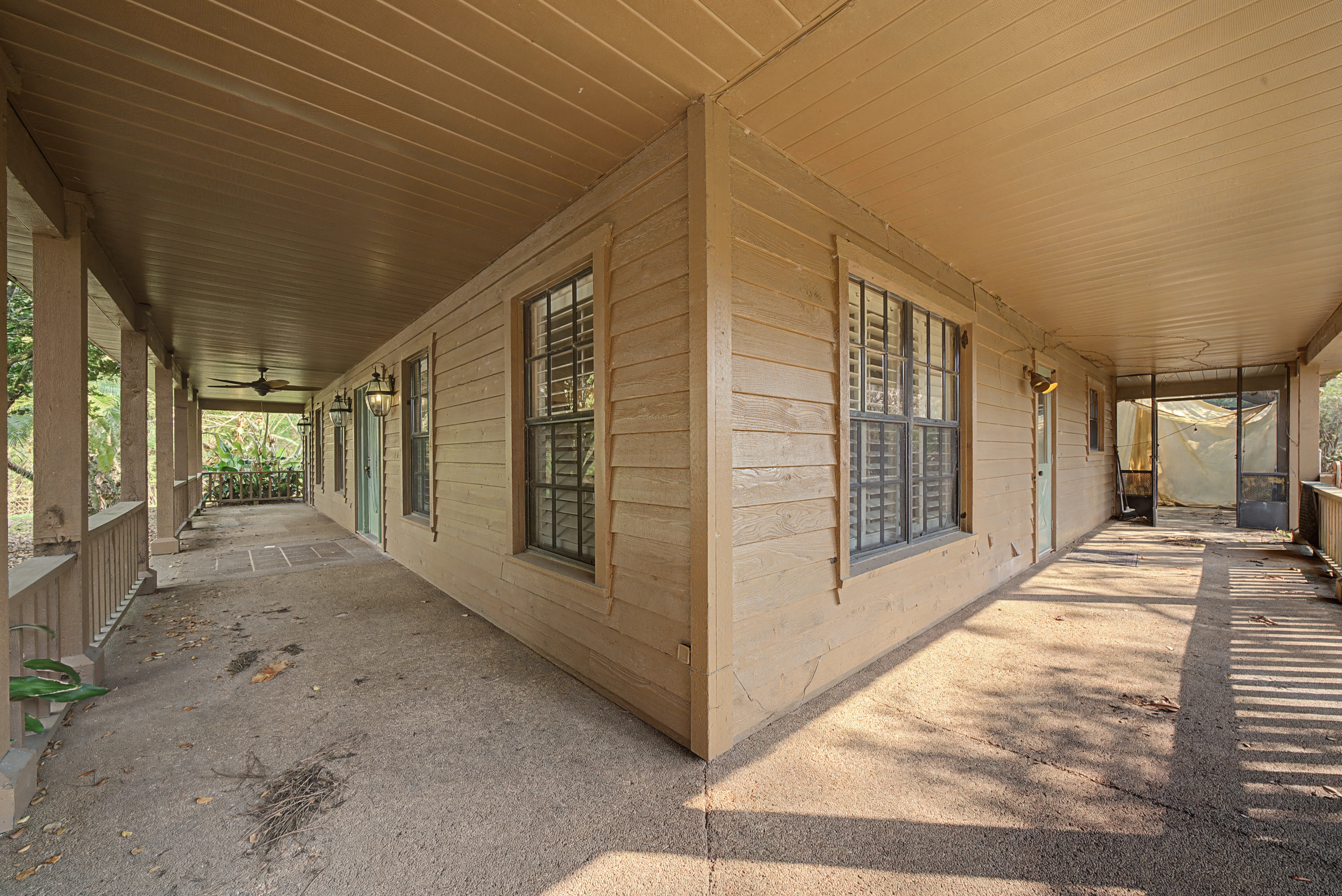 Current wrap-around porch at 665 Moon Ranch Road Sebring FL