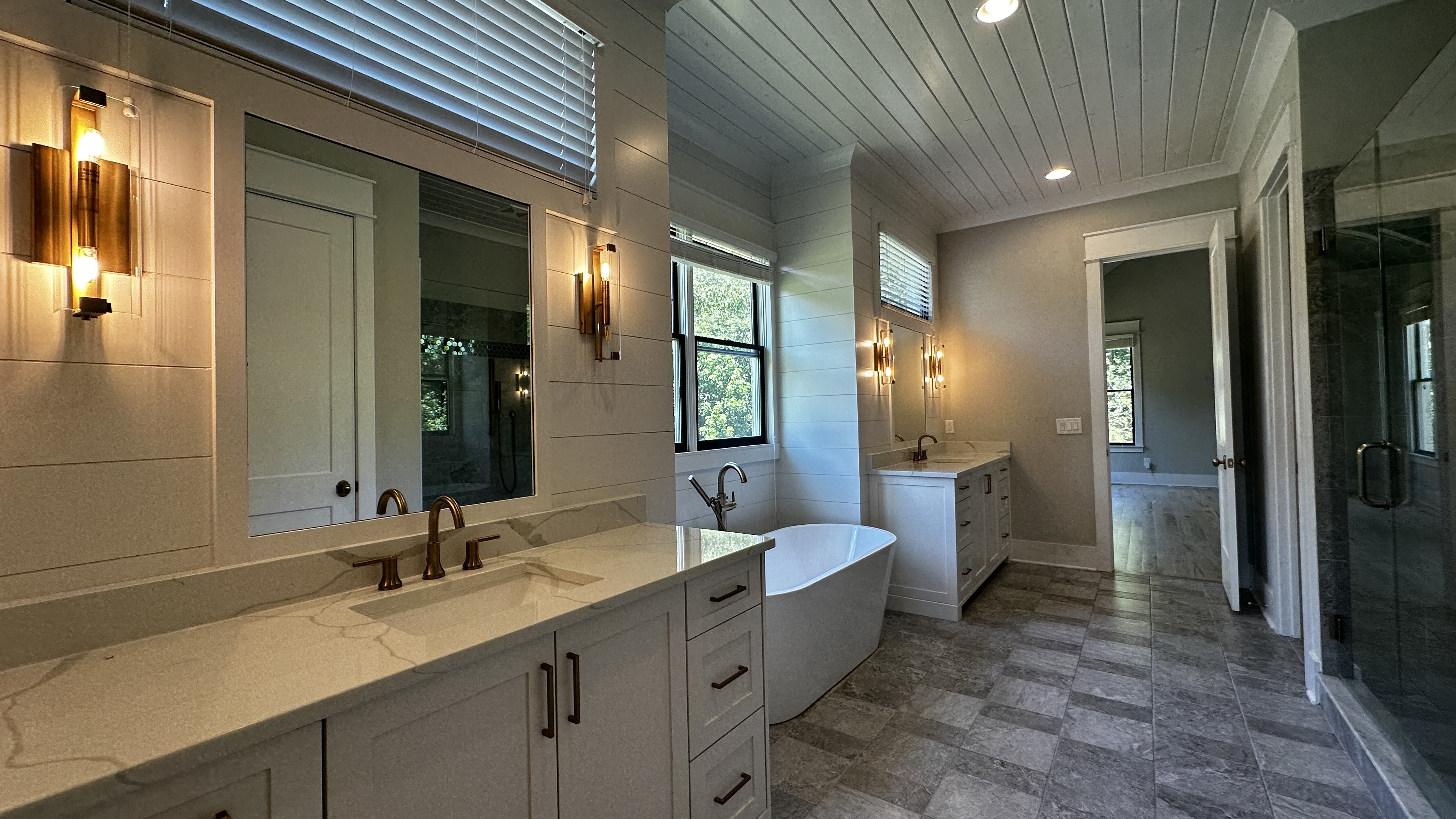 Walk-in closet at 5760 Lula Bridge Ct with custom white shelving