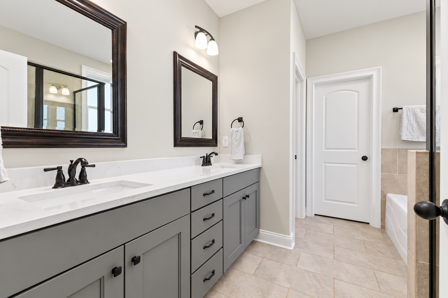 Bright modern double-vanity bathroom at 1537 Dartmouth Dr, Auburn AL